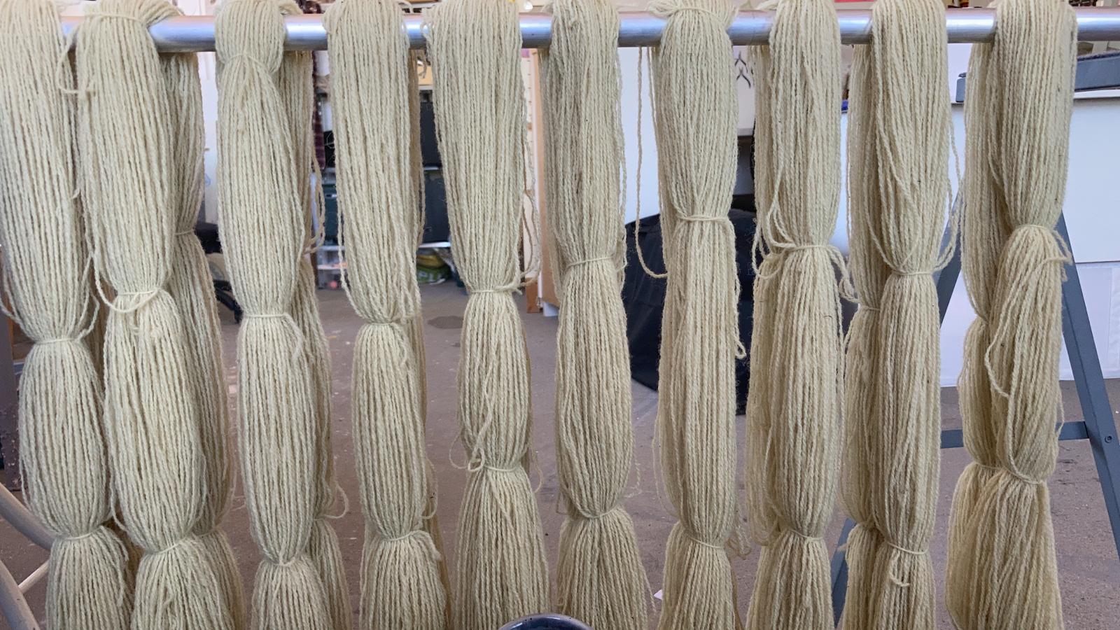 Nettle-dyed wool yarn in Angelica Falkeling's studio